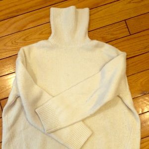 Vince wool cashmere turtleneck in cream.